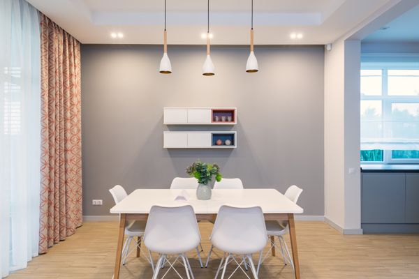 Three pendant lights over a dining table