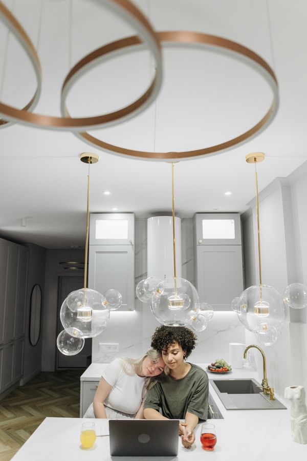 Clear glass globe pendants in a kitchen